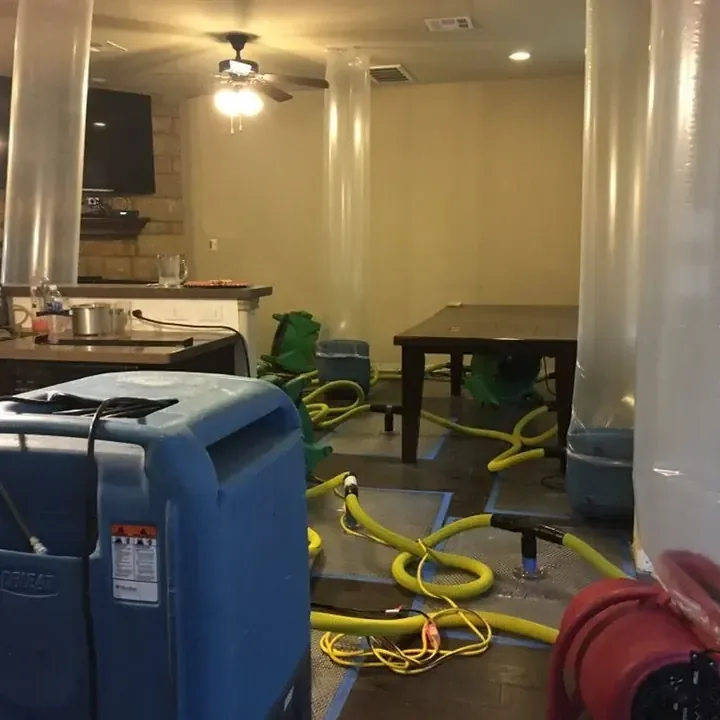 Truck-mounted water extraction gear set up on a job